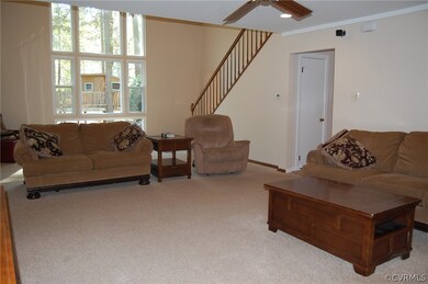 This den offers plenty of space for the entire family PLUS!  Look how bright and nice!