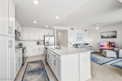 Kitchen with appliances with stainless steel finis