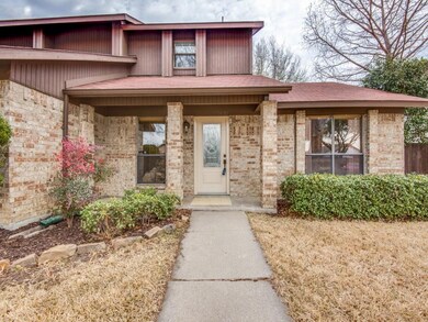 Covered front porch perfect to add a few chairs an
