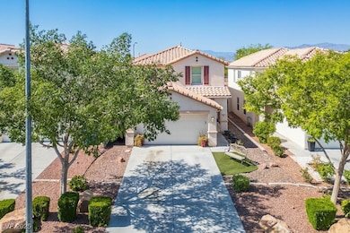 Mediterranean / spanish home featuring a tiled roo