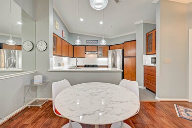 Opens to the spacious kitchen.