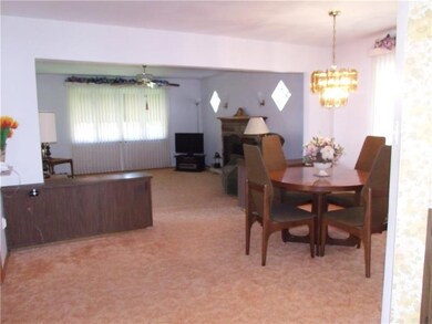Dining room open to the living room area.