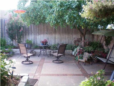 VIEW FROM COVERED DECK LOOKING OUT THROUGH DINING 