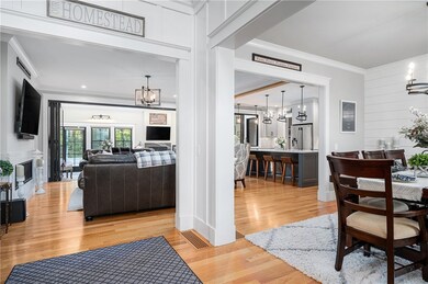 Entry foyer with view of living and dining rooms