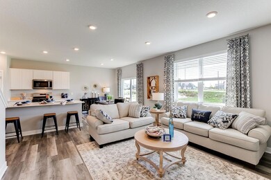 Beautiful open concept main floor creates an awesome flow. Model picture shown. Colors and finishes may vary.
