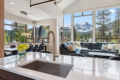 View from kitchen island of open floor plan, vault