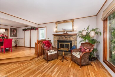 Snuggle up with a good book in front of the stone fireplace in the sunken living room