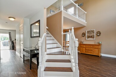 Beautiful entry into this home.  Staircase spindle
