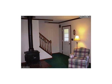 Note woodburning stove for nostalgic charm.