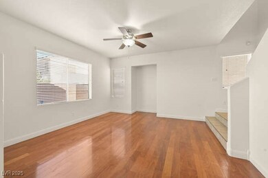 opens to the kitchen and dining area,  ceiling fan