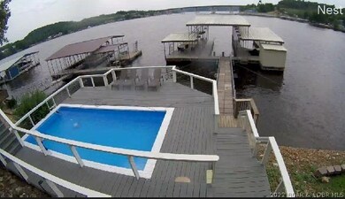 Salt water pool with outstanding lake views and the perfect depth for relaxing with a drink.