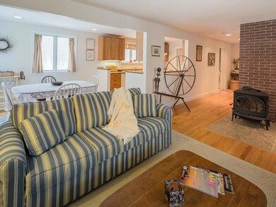 Open living area with wood stove