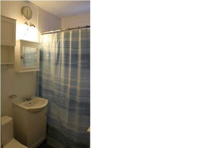 UPDATED BATHROOM WITH ADA TOILET, GFI OUTLET & UPD