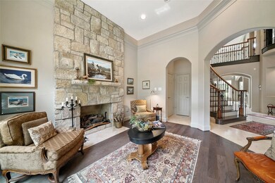 Another view of the formal living room looking back towards the entryway of the home.