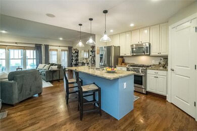 Walking into kitchen from entry hallway.