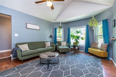Living area with ceiling fan and lights of light