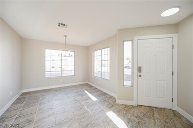 Formal dining space with STUNNING natural light.