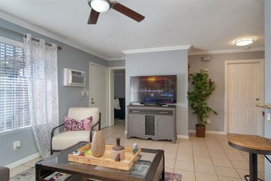 Wood burning fireplace behind TV stand.  Tv can be