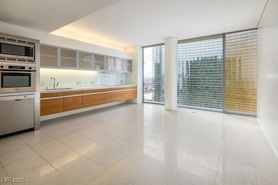 Kitchen with floor to ceiling windows, light count