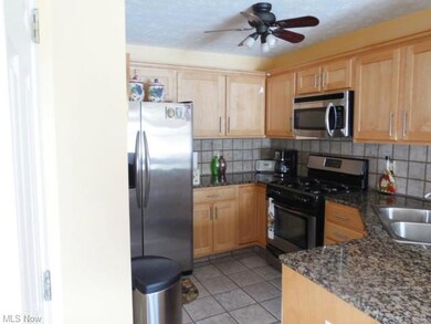 Built in Kitchen with newer Cabinets, granite tops
