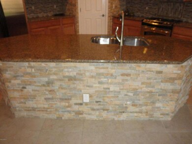 CUSTOM STONE FRONT OF ISLAND