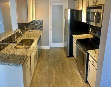 2445 NW 33rd St unit 1404, Oakland Park, FL 33309 - photo 4