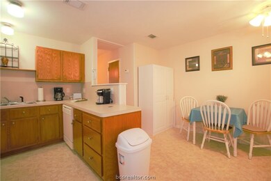 The breakfast area is located off of the kitchen a