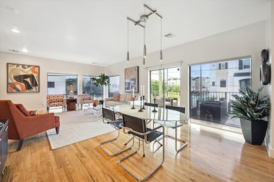 Bright second-floor living and dining area featuri