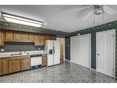 Washer and Dryer are in double door utility closet