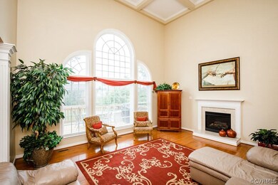 Sunken Great Room w Fireplace and Coffered Ceiling