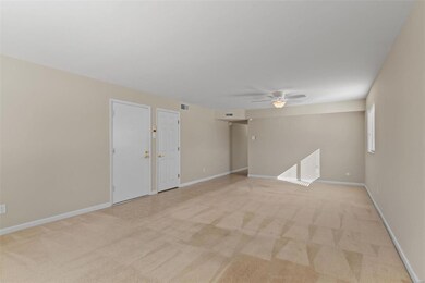 Living Room opens to Dining Room