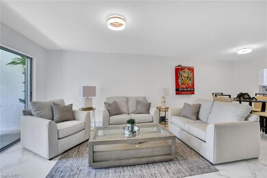 1055 Forest Lakes Dr unit F203, Naples, FL 34105 - photo 2