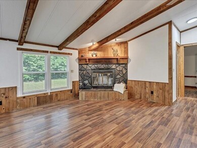 Living with mock fireplace