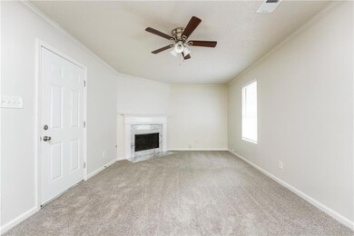 Unfurnished living room with light carpet, a premi