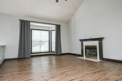 Huge Bay window lets in natural light, vaulted ceiling with fan and light,
