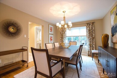 Formal dining room, gleaming hardwood floors, larg