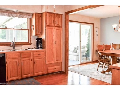 Kitchen has a pantry with pull out drawers.