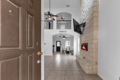 Foyer and looking into home and stonework.