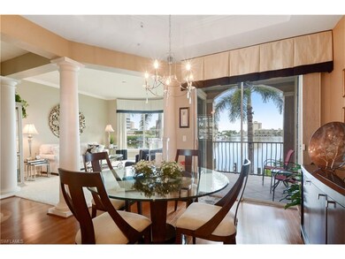 Dining area overlooking covered lanai and living r
