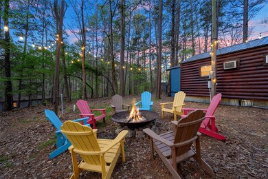 Yard at dusk with a fire pit