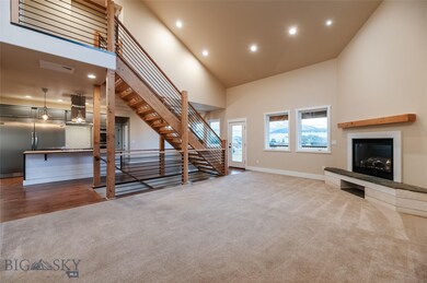 Open floor plan with vaulted ceilings, gas firepla