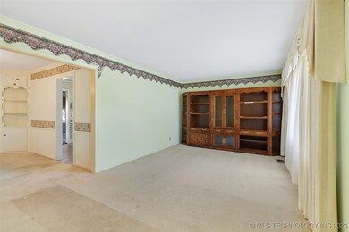 Carpeted since 1964 covering original oak floors.