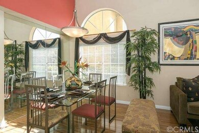 Formal dining area with a mirrored wall