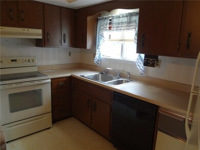 Kitchen includes Electric Cooktop, Refrigerator, D