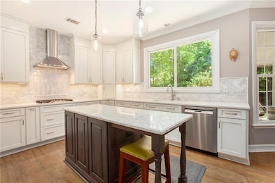 Gourmet kitchen with stainless steel appliances, w
