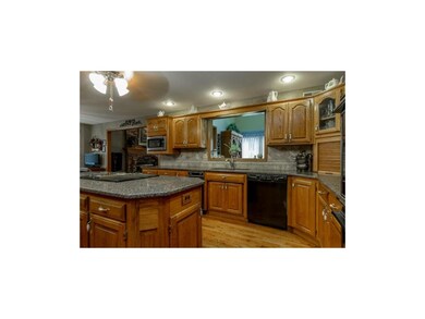 Kitchen Open to Hearth Room and Den