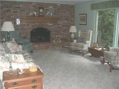 Family Room. Features full Brick Wall, Gas Insert 