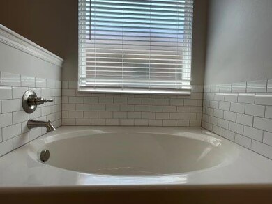 Bathroom with a bathing tub