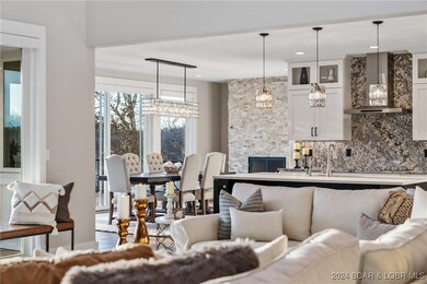 Open Concept living from living to upgraded kitche