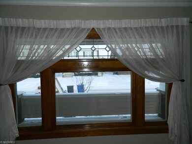 Beautiful leaded glass window in living room.